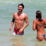 Giulia Costa e Philippe Azevedo na praia da Barra da Tijuca